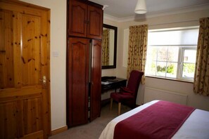 Premium bedding, desk, iron/ironing board, rollaway beds