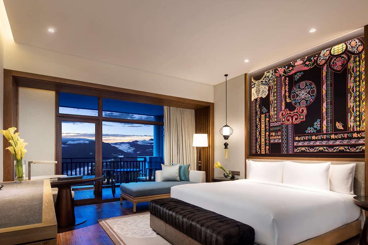 ห้องดีลักซ์ | เครื่องนอนระดับพรีเมียม, ผ้านวมขนเป ็ด, เตียงพร้อมฟูกเสริมที่นอน