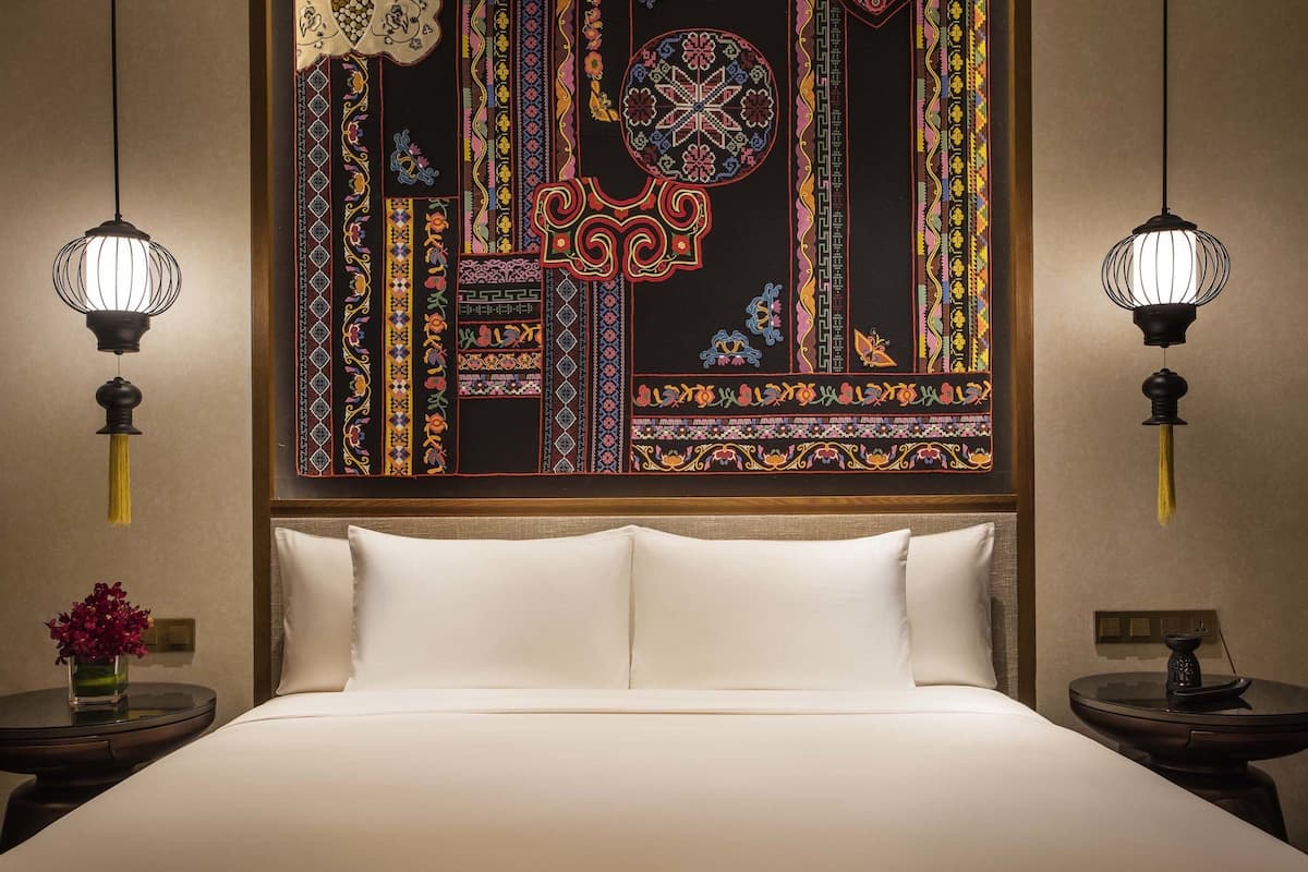 Premium bedding, down comforters, pillowtop beds, minibar