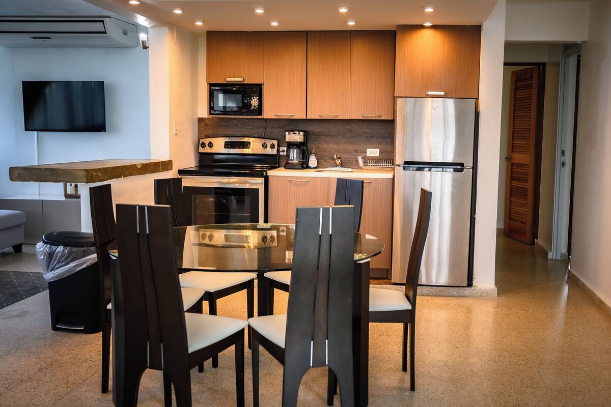 deluxe apartment, 2 bedrooms, kitchen, ocean view | private kitchen | fridge, coffee/tea maker