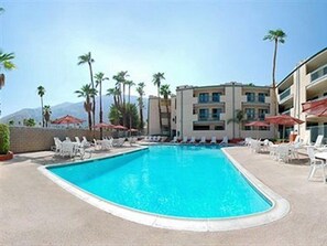 2 outdoor pools, open 8 AM to 10 PM, pool umbrellas, pool loungers