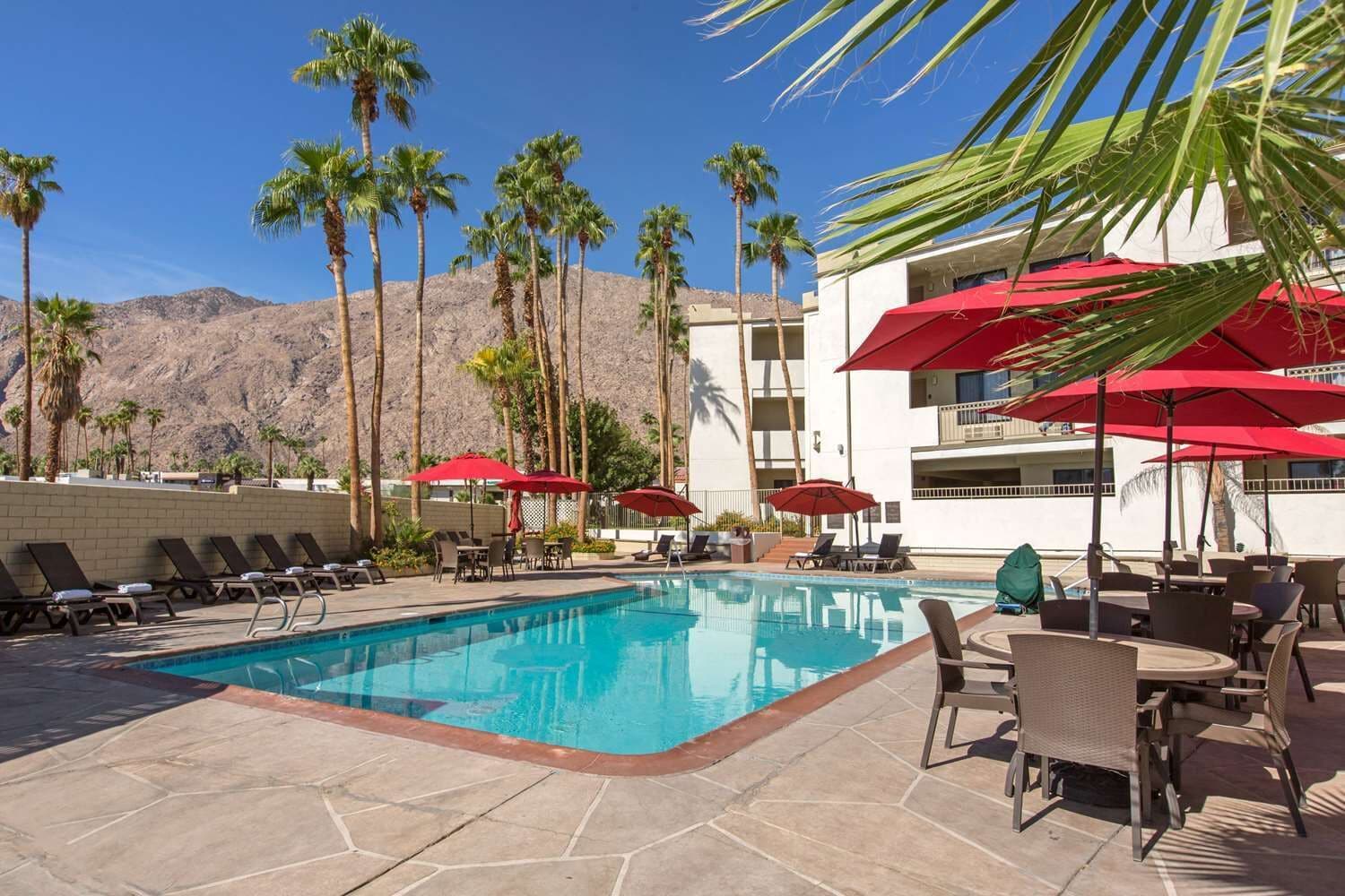 2 outdoor pools, open 8 AM to 10 PM, pool umbrellas, sun loungers