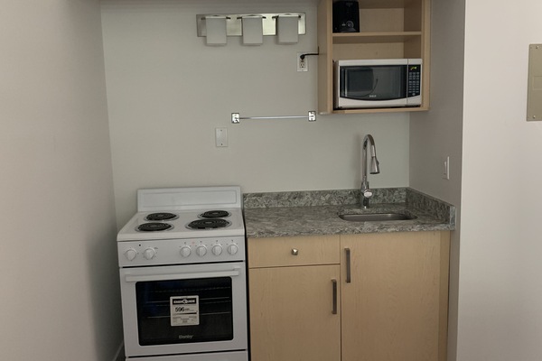 Basic Room, 2 Double Beds, Kitchenette | Bathroom | Combined shower/tub, free toiletries, hair dryer, towels