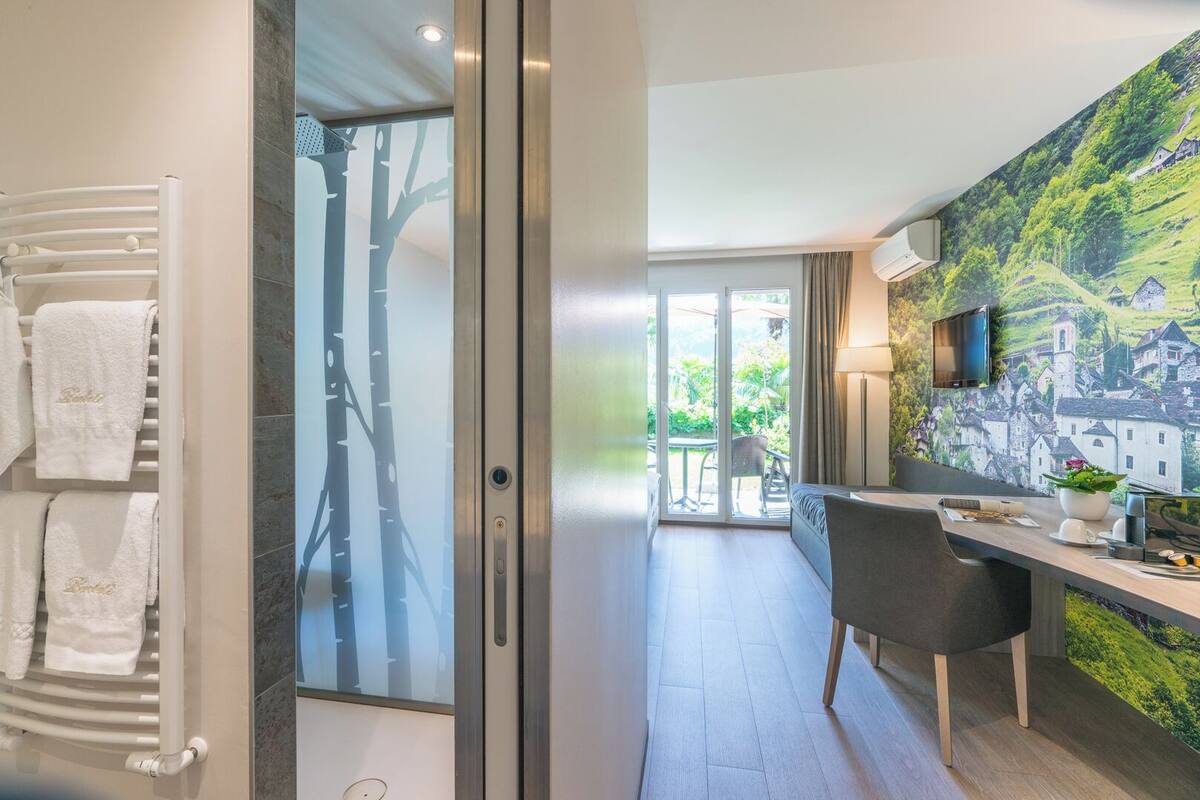 premium triple room, 3 single beds, private bathroom | 1 bedroom, premium bedding, minibar, in-room safe