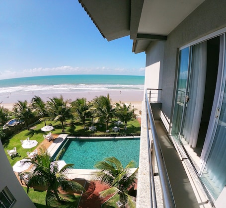 Triple Room, Partial Sea View | 1 bedroom, in-room safe, blackout drapes, iron/ironing board