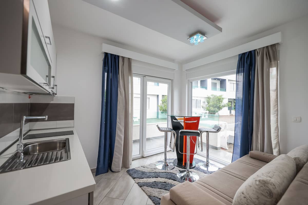 Apartment, Pool View, Ground Floor | 1 bedroom, desk, soundproofing, free WiFi