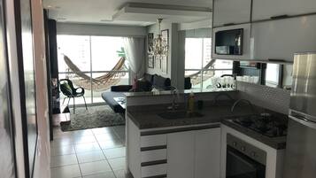 Deluxe Apartment, 2 Bedrooms | Private kitchen | Fridge, microwave, oven, stovetop