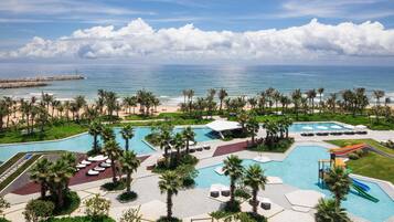 3 outdoor pools, open 9:00 AM to 10:00 PM, pool umbrellas, sun loungers