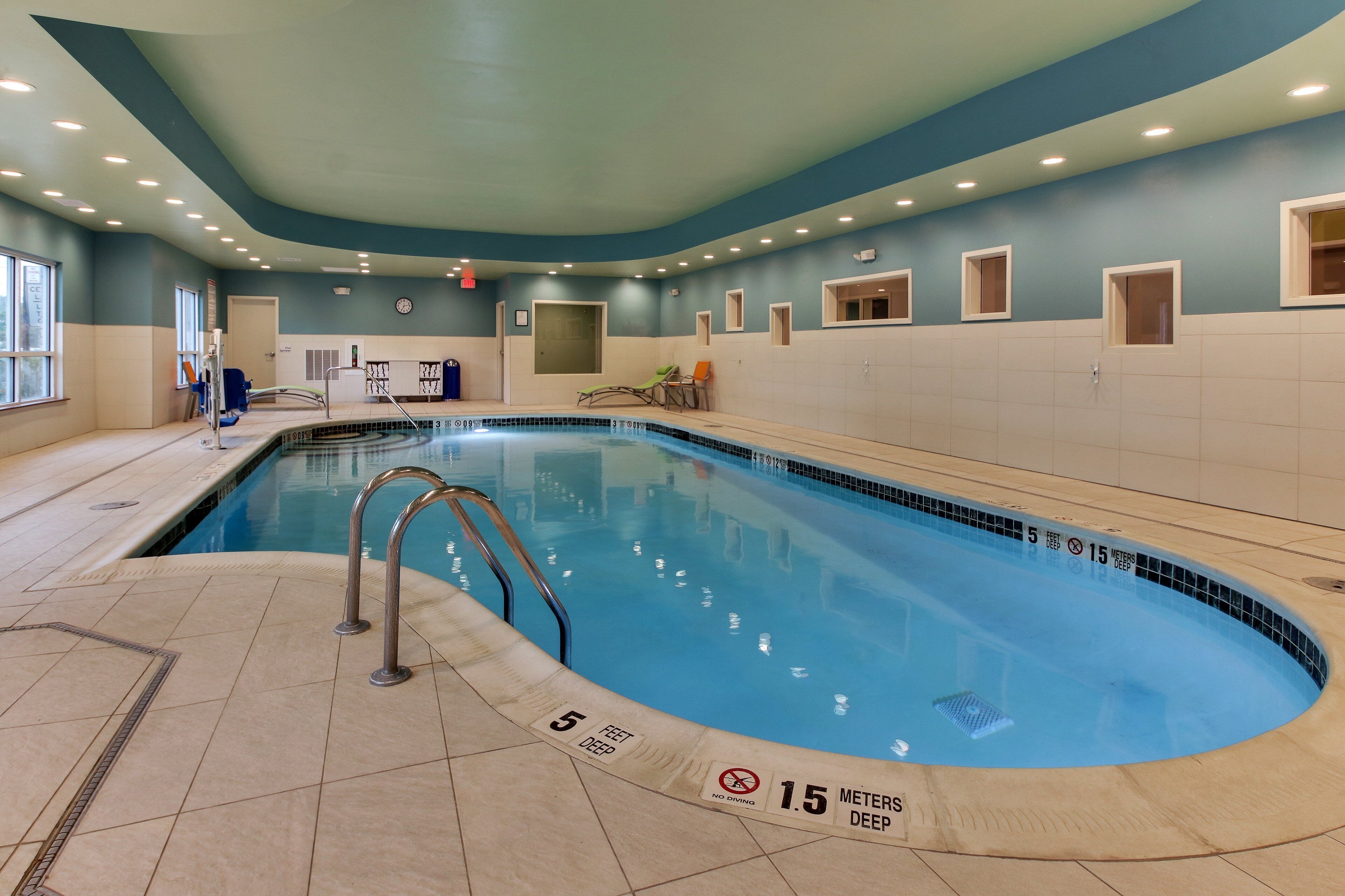Indoor pool, open 8 AM to 10 PM, pool loungers