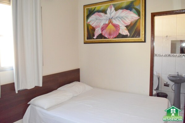 Suite Deluxe | Ropa de cama de alta calidad y cortinas blackout 