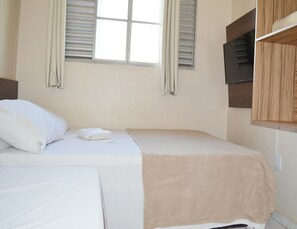 Suíte standard | Roupas de cama premium, cortinas blackout, ferros/tábuas de passar roupa