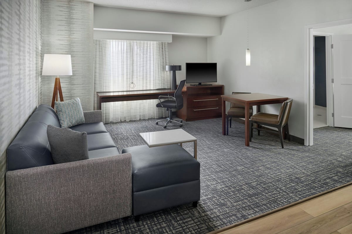 Suite, 1 Bedroom | Living area | 40-inch Smart TV with cable channels, TV, Netflix