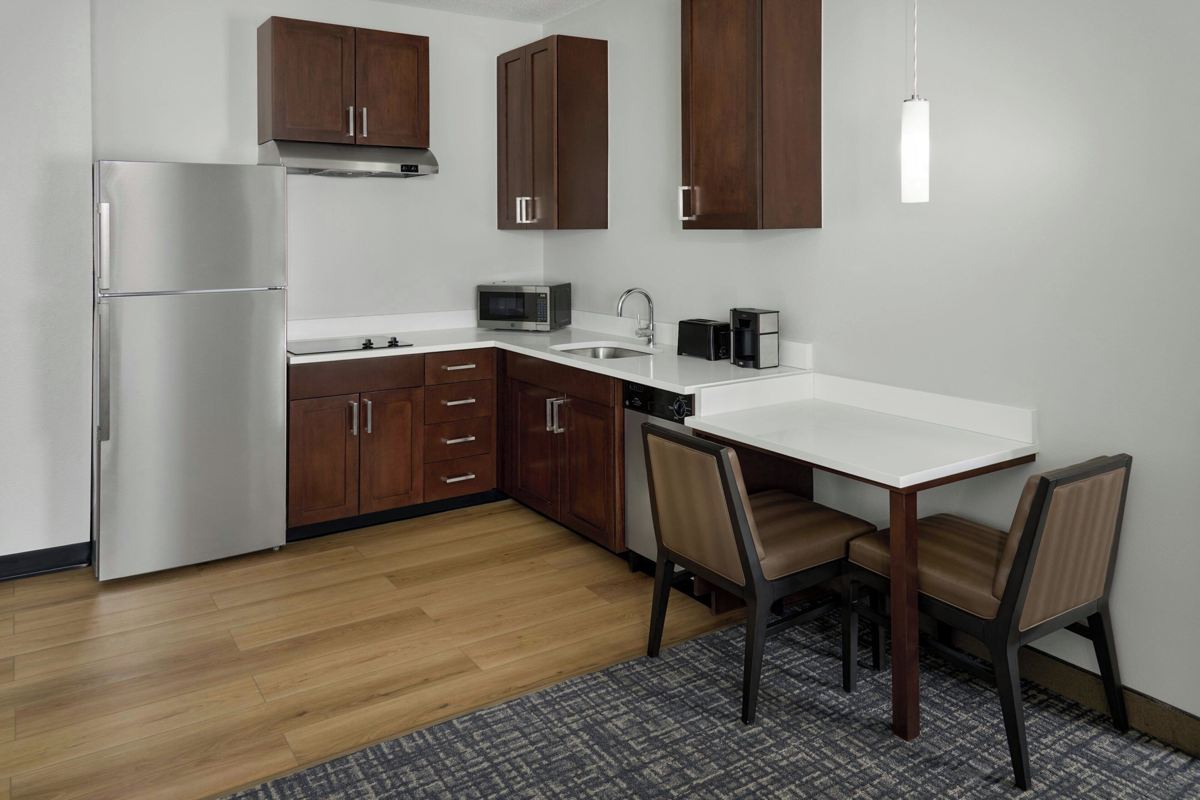 Full-sized fridge, microwave, stovetop, dishwasher