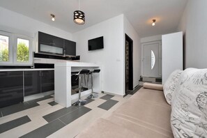 Apartment, 1 Schlafzimmer, Erdgeschoss | Wohnbereich