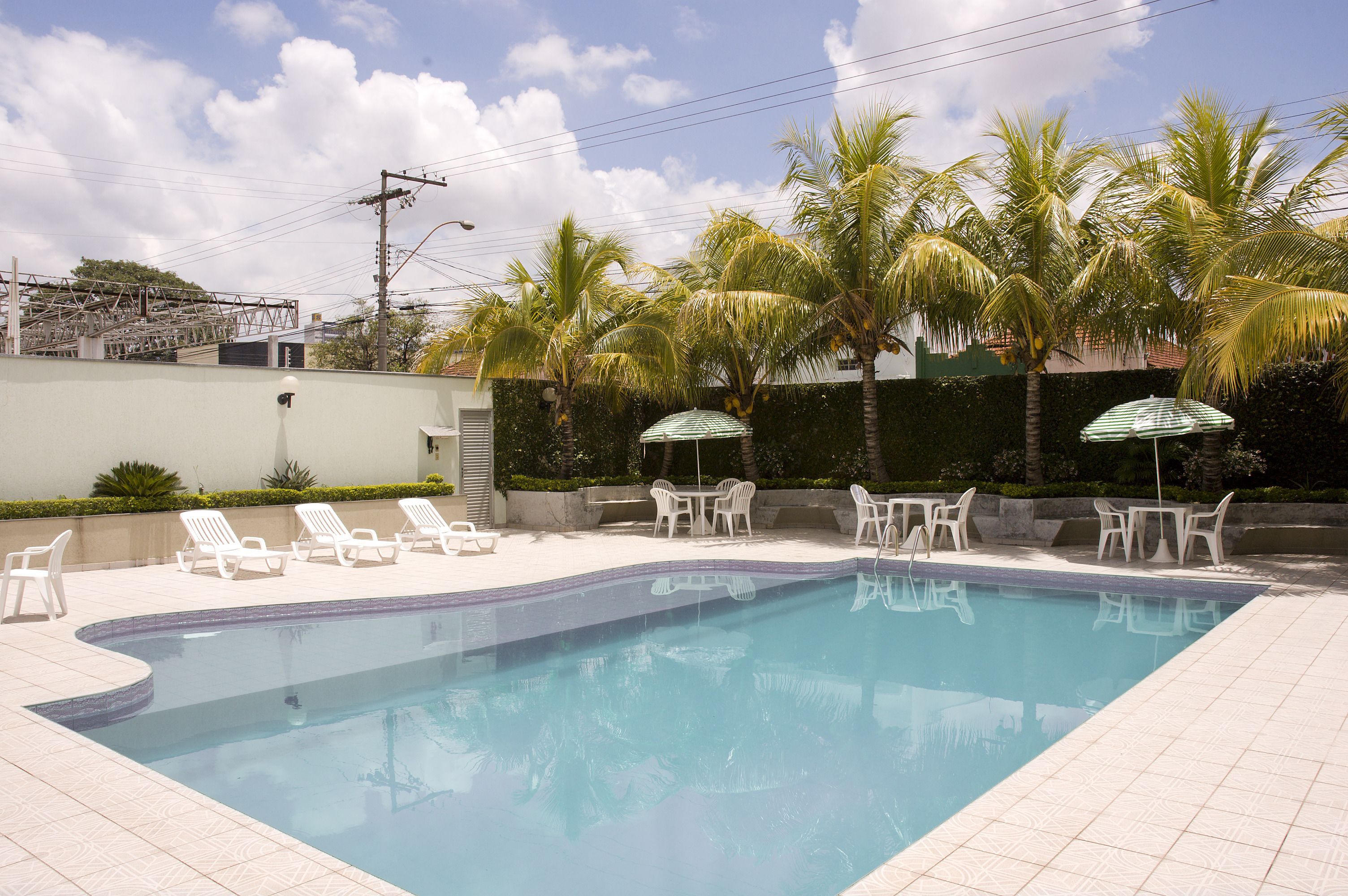 indoor pool, outdoor pool, open 6 am to 10 pm, pool umbrellas