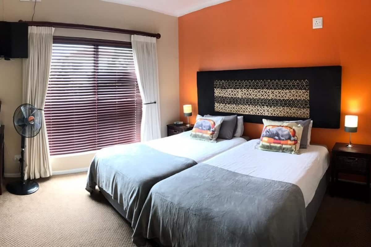 Standard Room (Hippo Room) | 1 bedroom, in-room safe, desk, WiFi (free)