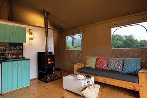 Luxury Tent, 2 Bedrooms | Living area | Fireplace