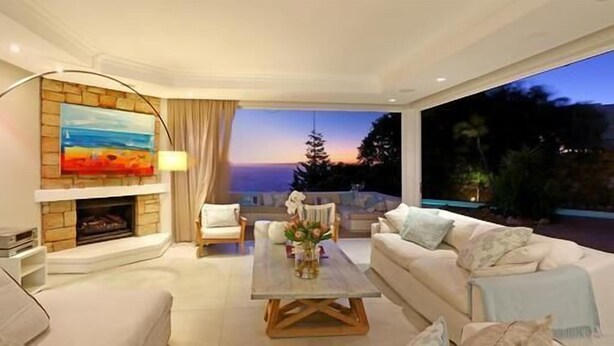 Family House, 5 Bedrooms | Living room | 60-inch LED TV with digital channels, TV, DVD player - Hideaway Beach Villa (Cape Town)