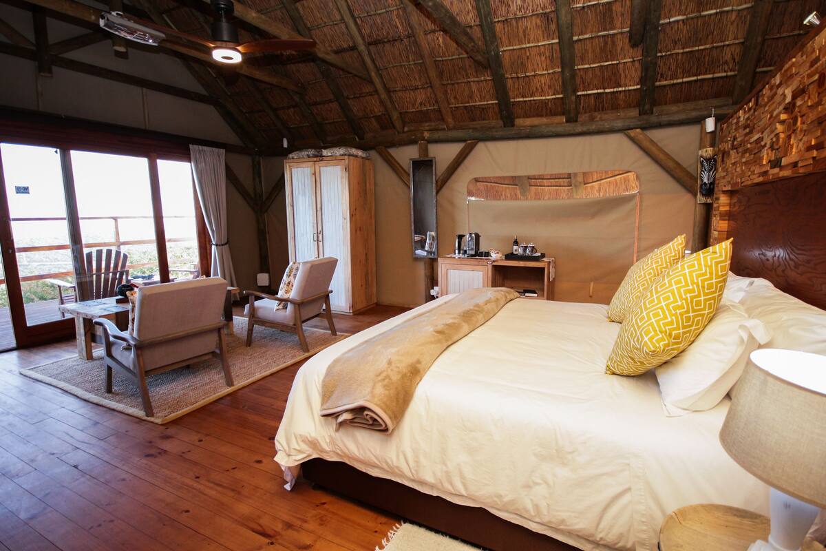 Country Luxury Safari Tent | Egyptian cotton sheets, premium bedding, pillowtop beds, minibar