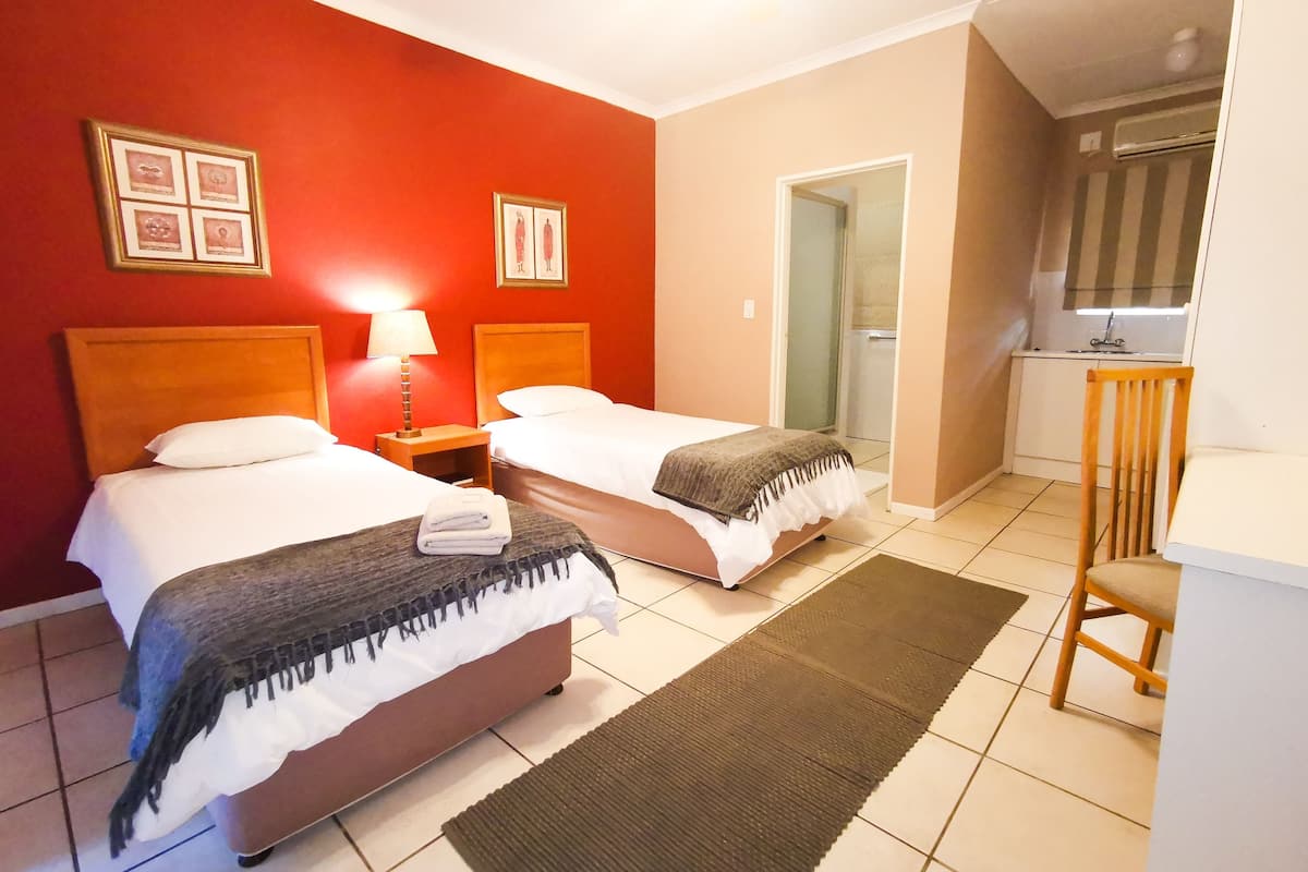 Desk, WiFi (free), bed sheets