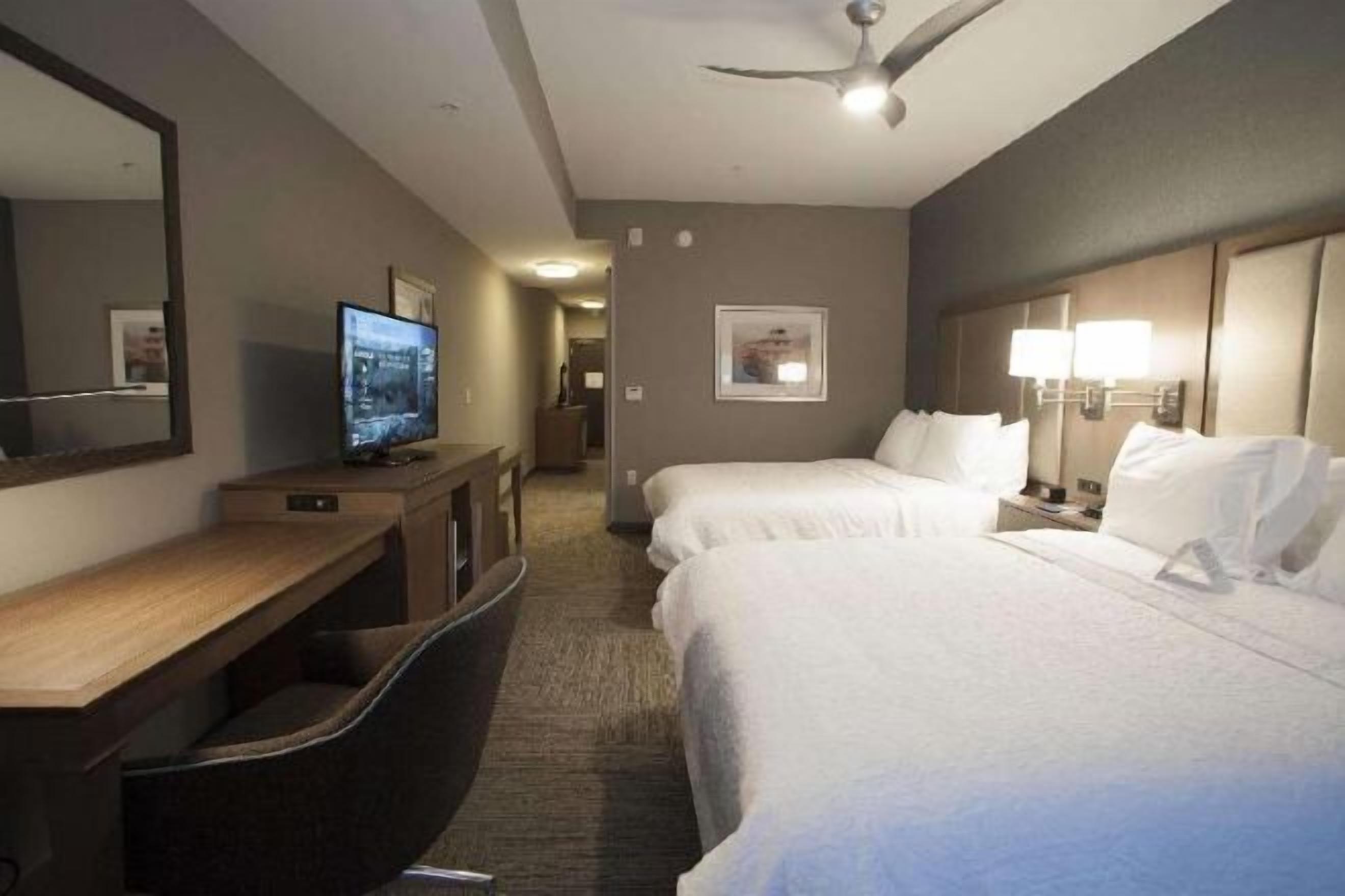 Desk, laptop workspace, blackout drapes, iron/ironing board