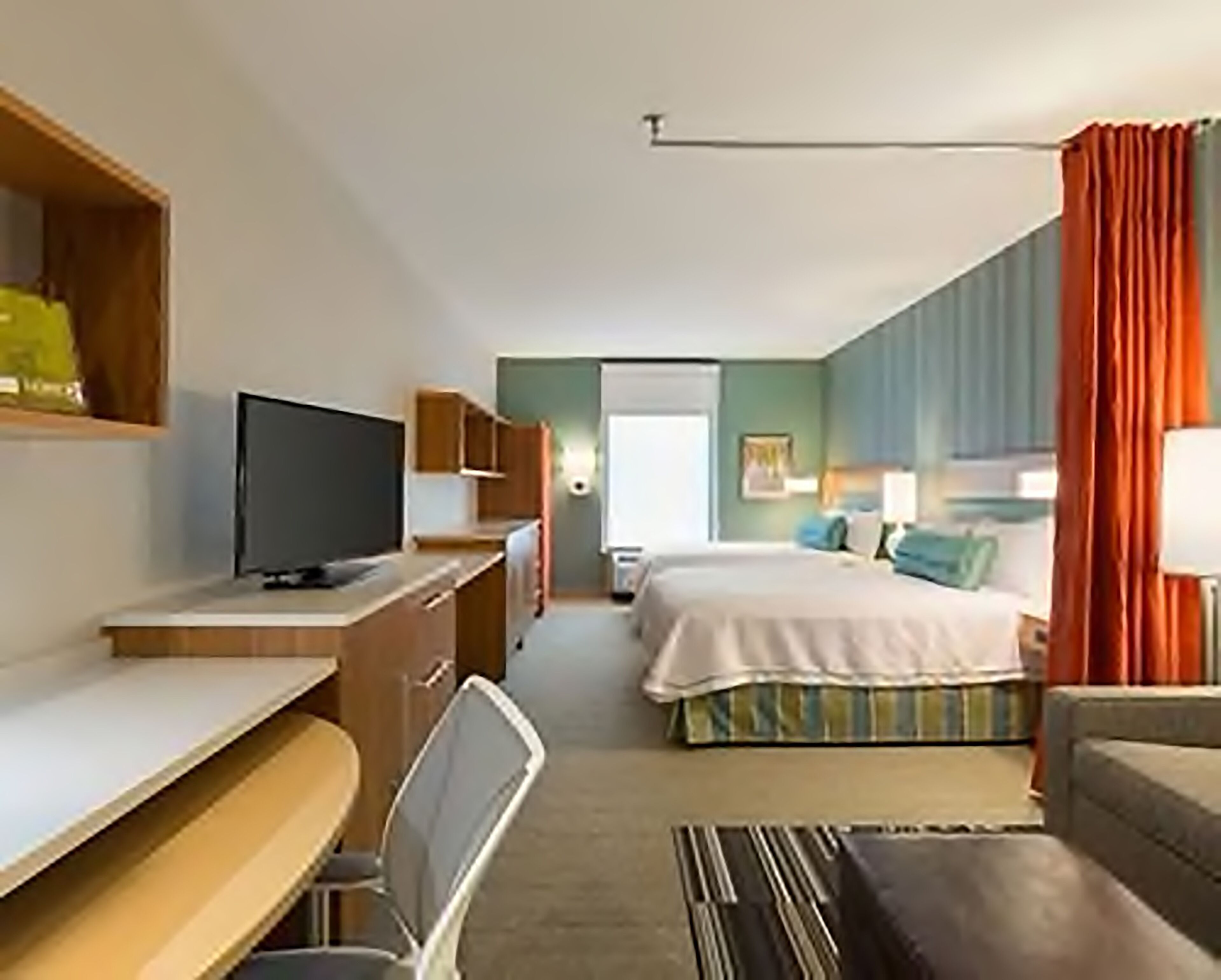 desk, blackout curtains, iron/ironing board, free cots/infant beds