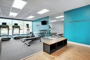 A modern gym with treadmills, dumbbells, and weight machines. - Fairfield Inn & Suites Houston Northwest/Willowbrook (Houston)