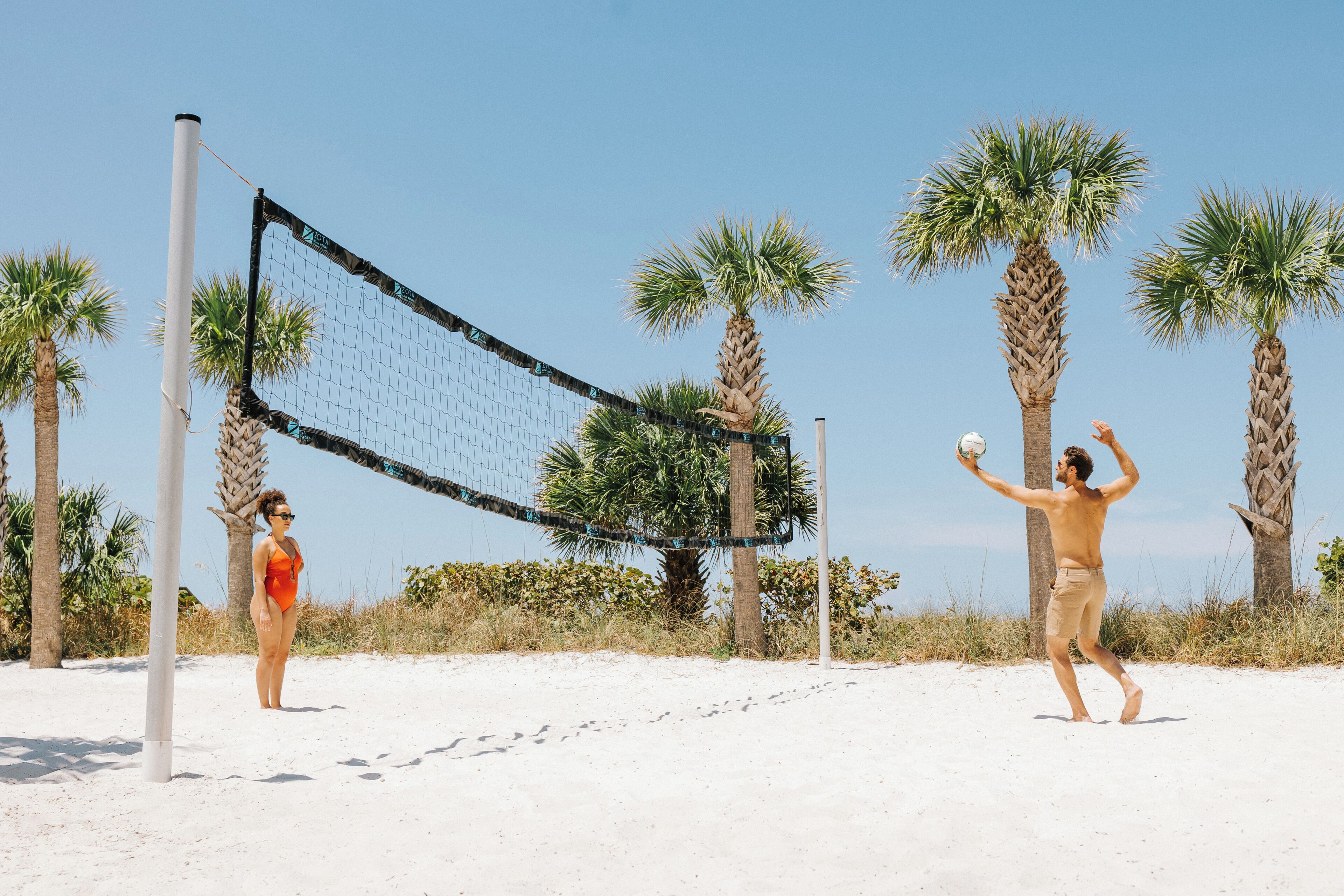 private beach, white sand, beach cabanas, sun-loungers