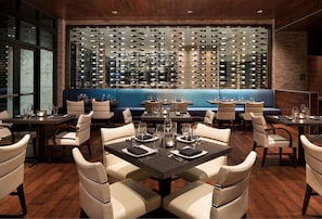 Enjoy dining in style with a beautifully set table and an extensive wine selection.
