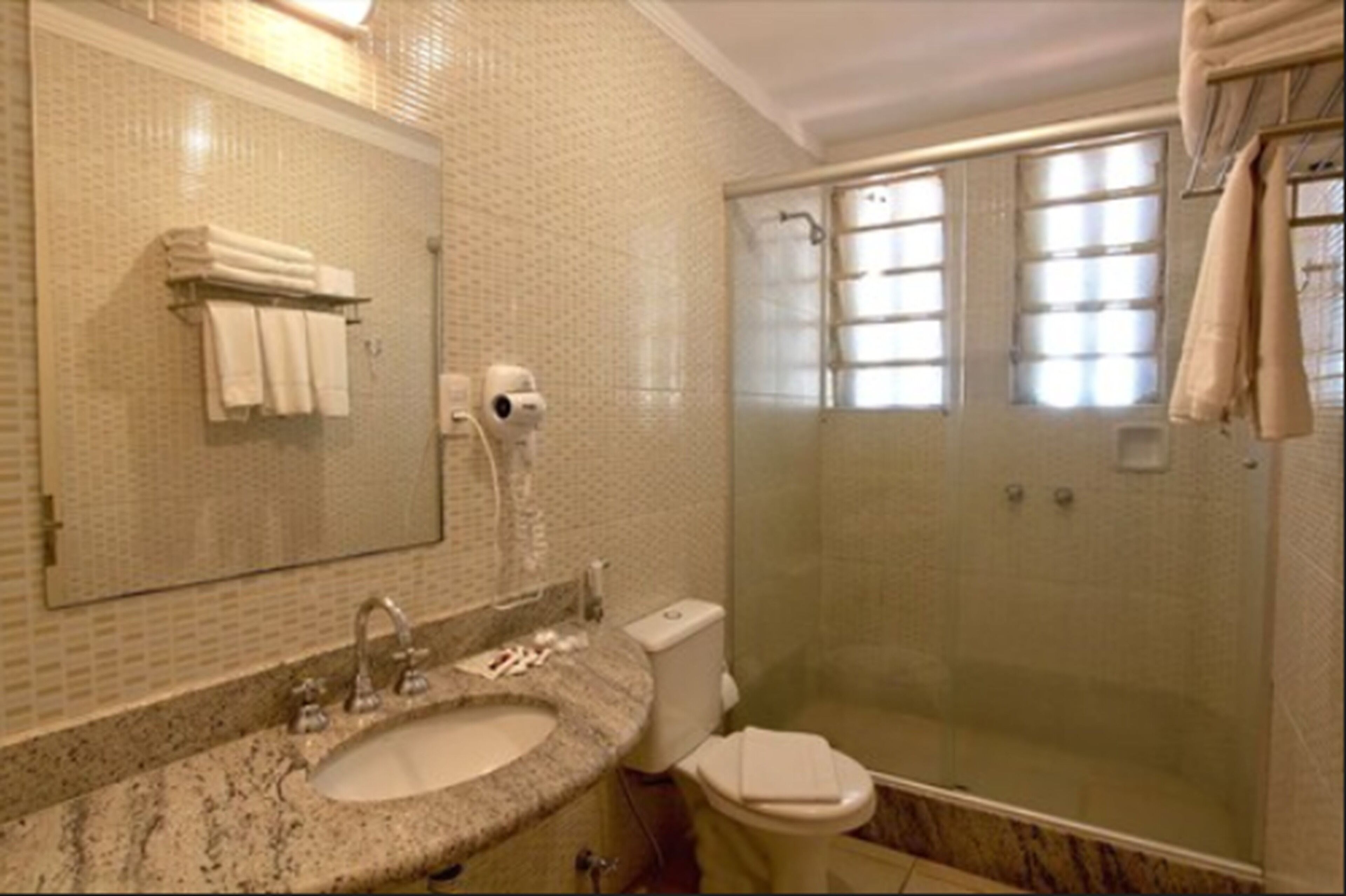 shower, free toiletries, hair dryer, towels