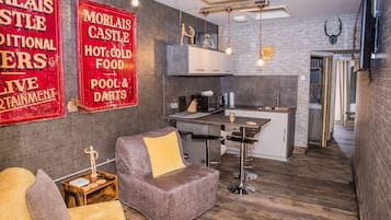 Premier-studio, kylpyhuone makuuhuoneen yhteydessä (Studio 1 - Family) | Näkymä majoituspaikasta