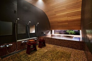 Eco-friendly toiletries, hair dryer, slippers, towels