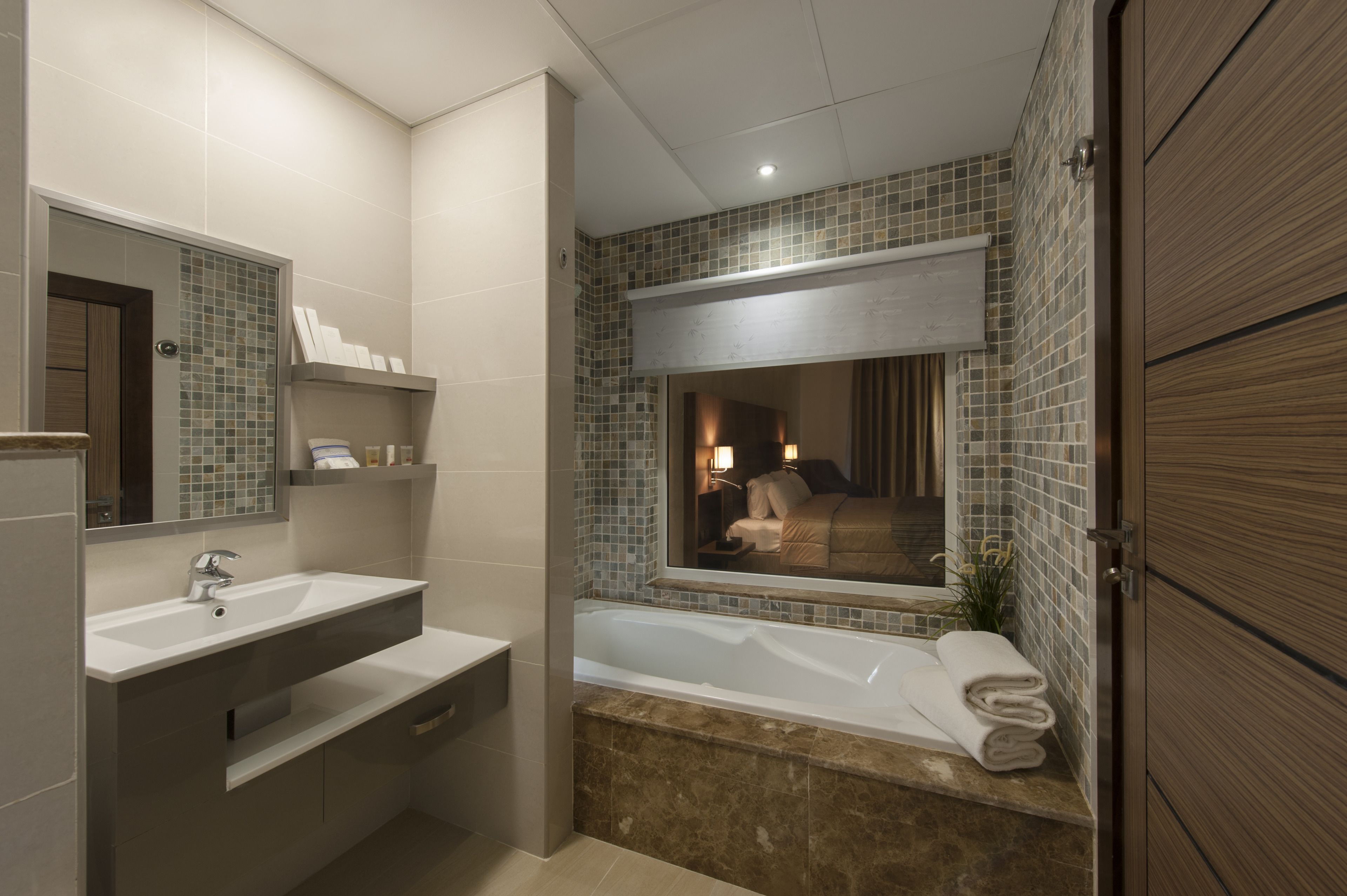 standard studio, 1 queen bed, smoking | bathroom | free toiletries, hair dryer, bathrobes, slippers