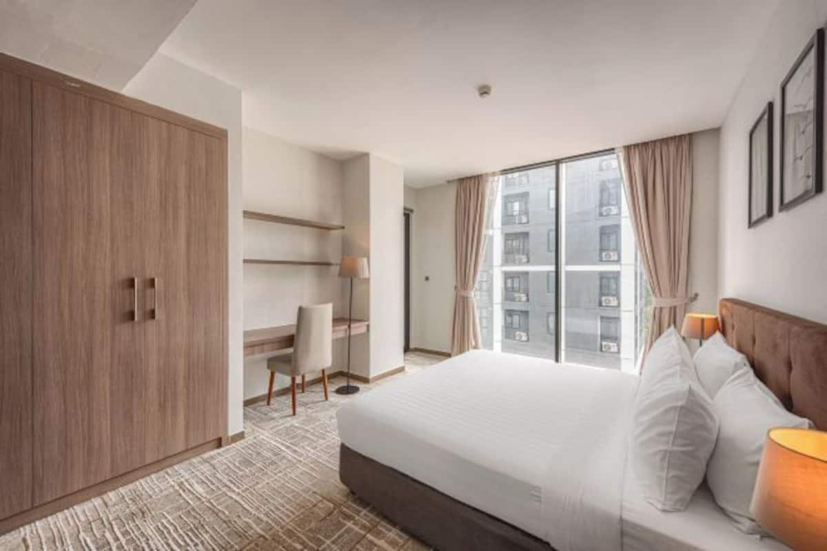 In-room safe, desk, laptop workspace, blackout curtains