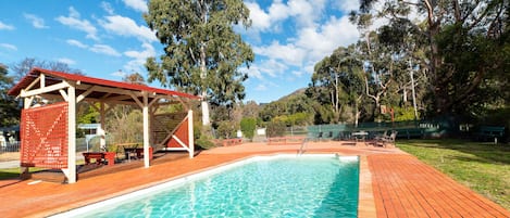 Seasonal outdoor pool, pool loungers