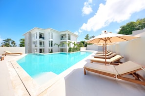 2 outdoor pools, pool umbrellas, sun loungers