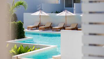 2 outdoor pools, pool umbrellas, sun loungers