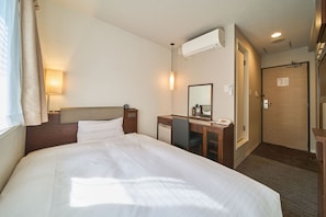 Blackout drapes, iron/ironing board, free WiFi, bed sheets