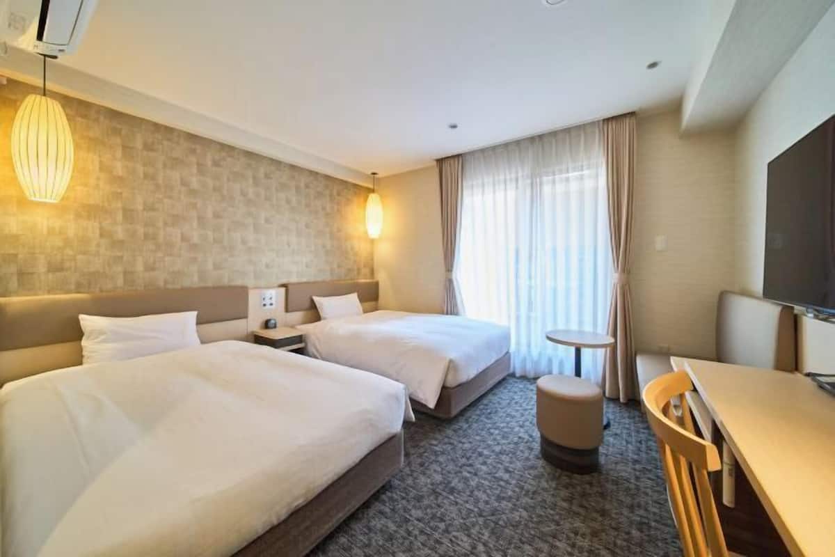 Down comforters, blackout drapes, iron/ironing board, free WiFi