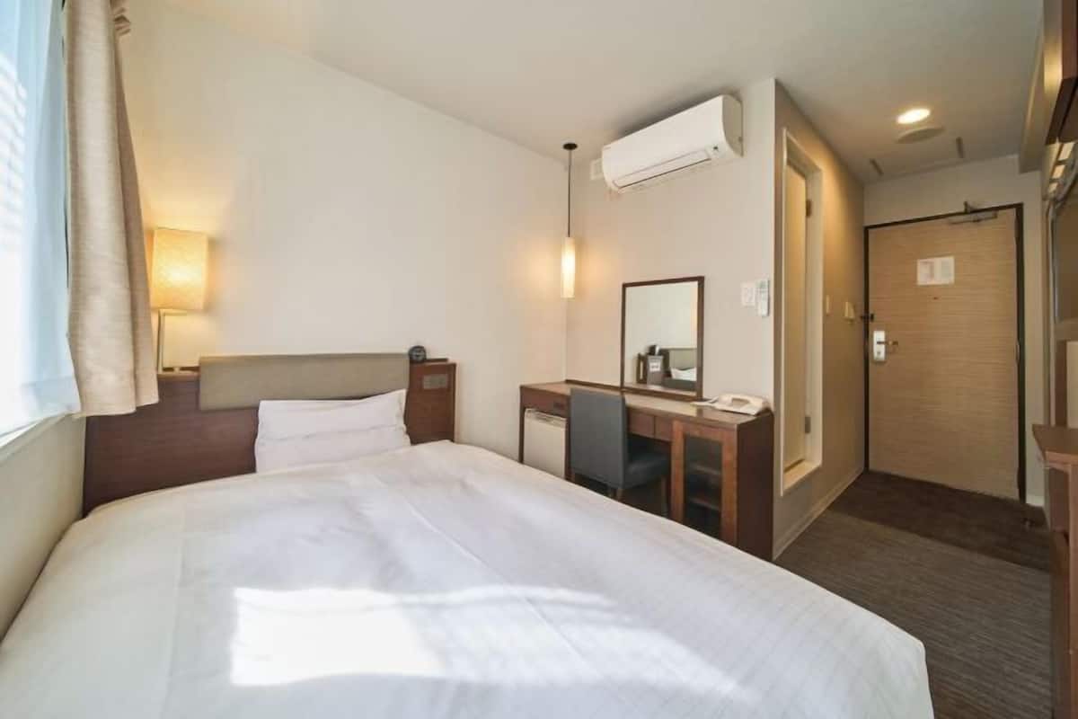 Blackout curtains, iron/ironing board, free WiFi, bed sheets