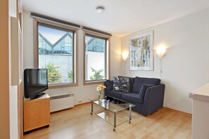 Comfort Apartment, 1 Double Bed with Sofa bed | Living room | 81-cm flat-screen TV with cable channels, TV - Bjørvika Apartments - Fiskepiren (Stavanger)