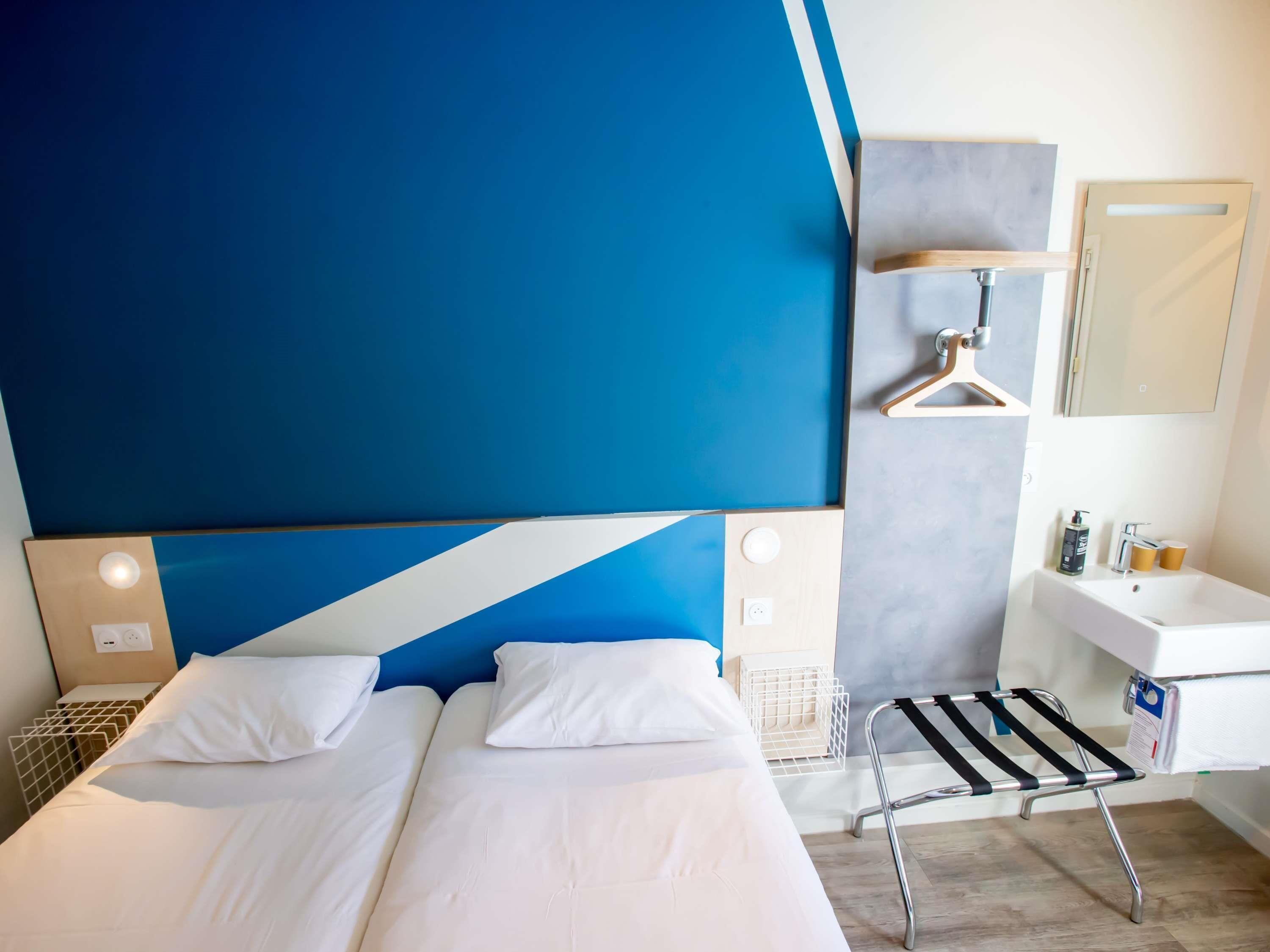 Zweibettzimmer, 2 Einzelbetten | Zimmersafe, Schreibtisch, schallisolierte Zimmer, kostenlose Babybetten