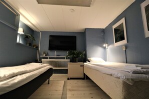 Dobbelt- eller tomannsrom – superior, 1 soverom | Sengetøy av topp kvalitet, strykejern/-brett og wi-fi (inkludert)