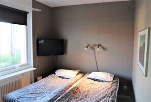 Ropa de cama de alta calidad y tabla de planchar con plancha 