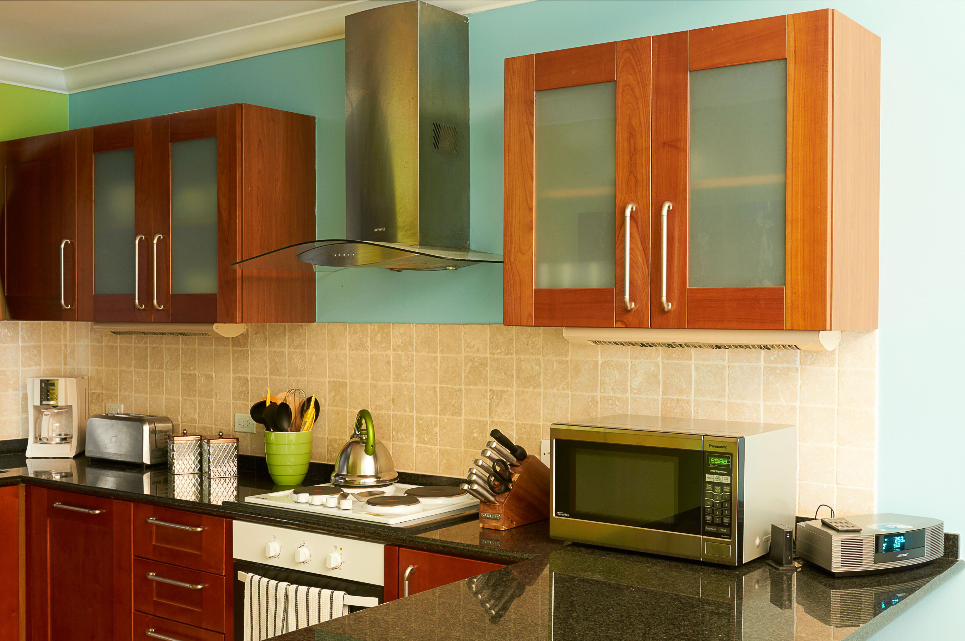 condo, 2 bedrooms, pool access, golf view | private kitchen | full-sized fridge, microwave, oven, stovetop