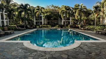 4 outdoor pools, open 6:00 AM to 10:00 PM, pool umbrellas, pool loungers