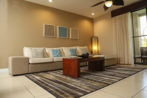 Luxury Apartment, 3 Bedrooms, Balcony, Garden View | Living area | 42-inch LED TV with cable channels, TV - Coco Breeze Private Residence (Sardinal)