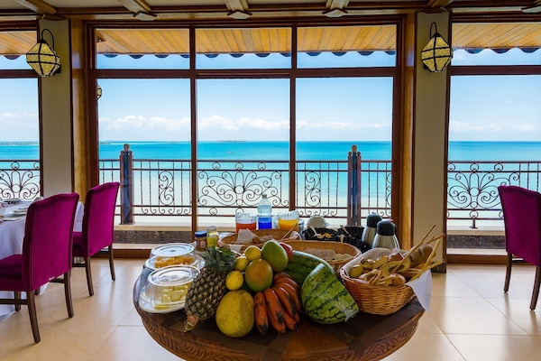 Lunch, dinner, brunch served; international cuisine, beach views