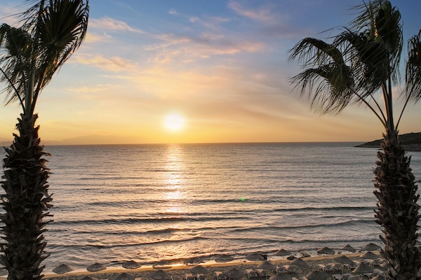 Private beach nearby, sun-loungers, beach umbrellas