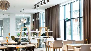 Breakfast, lunch, dinner served; international cuisine